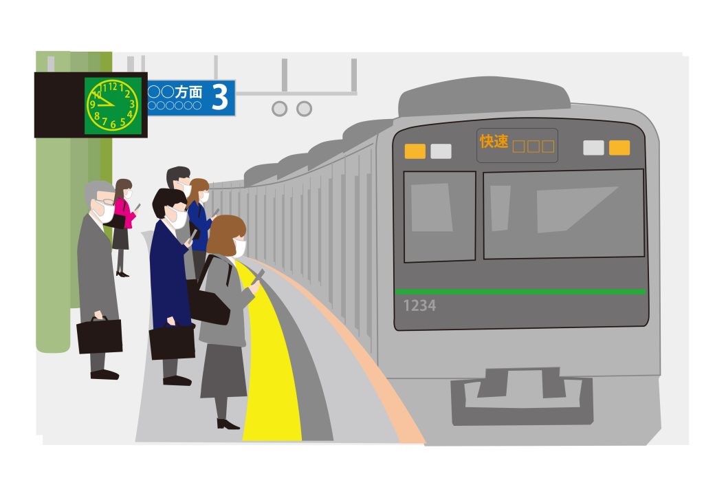 電車を待つ人々