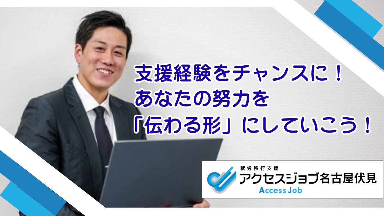 パソコンを持つ男性の画像